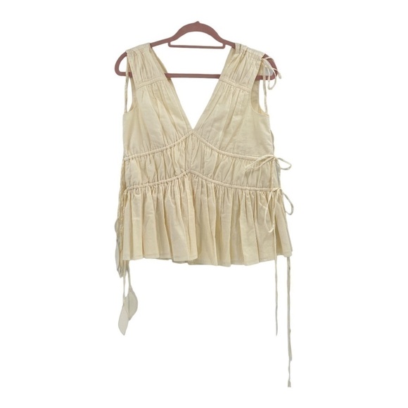 Tory Burch
Sleeveless Smocked Peplum Top COLOR New Ivory size 0 - Picture 9 of 17